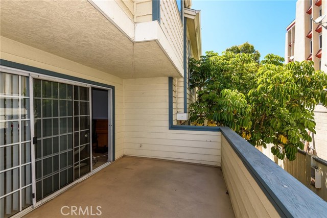 Large entertaining balcony off living room perfect for weekend BBQ.