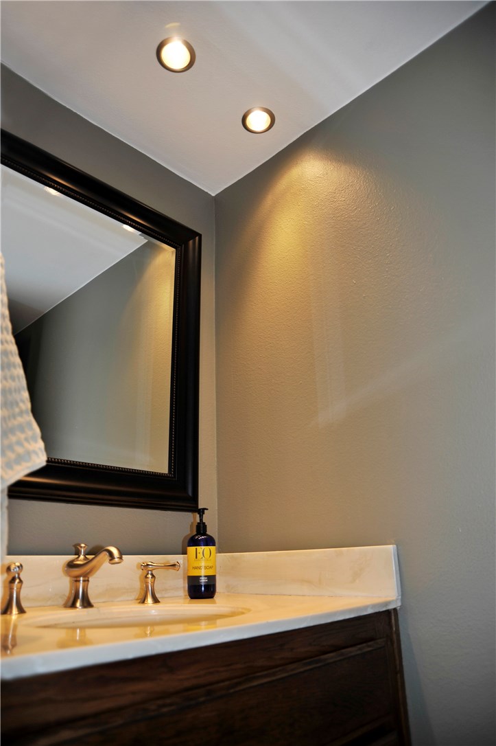 Powder room off living areas.