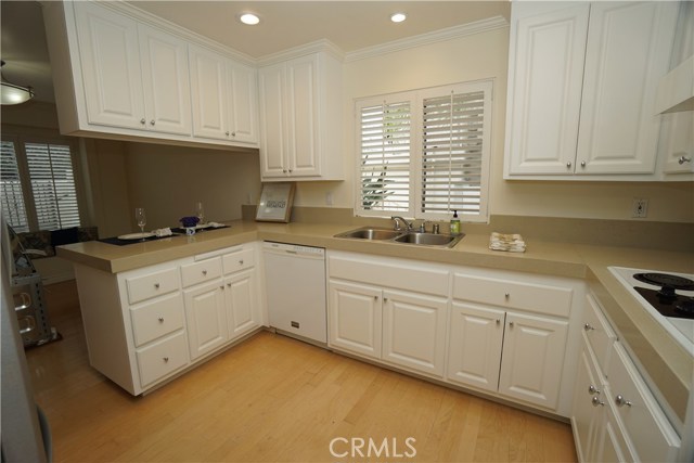 Newly updated kitchen.  Breakfast bar. Opens to dining room.