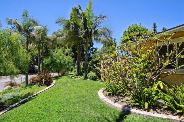 Beautifully designed landscaping on this almost 1/2 acre estate