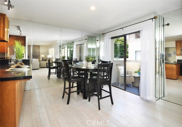 Dining area opens to the cozy balcony.  This unit has been freshly painted throughout.