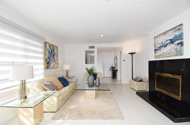 Living Room with Marble Fireplace