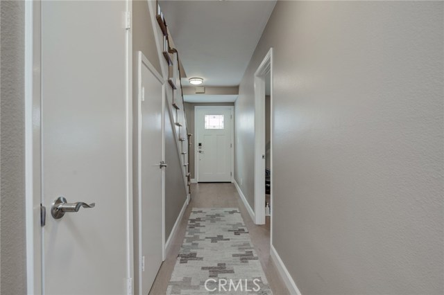 Downstairs looking towards entry - garage door on left. New super quiet garage door.