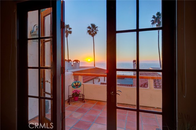 Through the french doors to watch the daily show. This deck is wide enough to have a dinner party on it or a nice patio set with umbrellas and table.