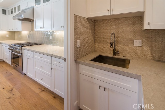 Giant walk-in pantry (look at next few pics) has prep sink and amazing storage!