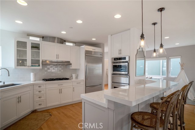 Kitchen with sitting area in background