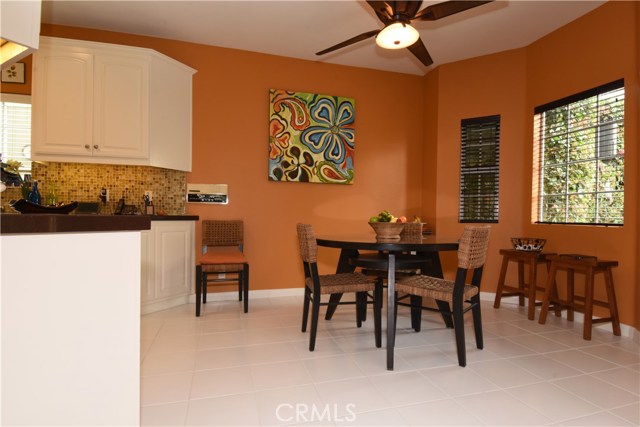 Casual eating area with kitchen on the left