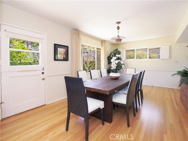 Large dining room with Dutch door leading to rear yard.