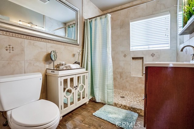 Remodeled bath w tile floor&  large shower