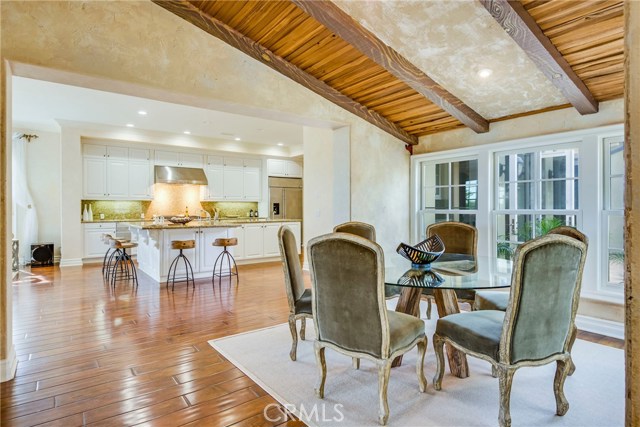 Breakfast nook looking into the kitchen area with large granite countertop.