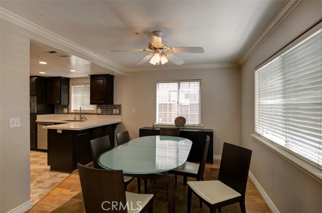 Large dining room with hard wood flooring