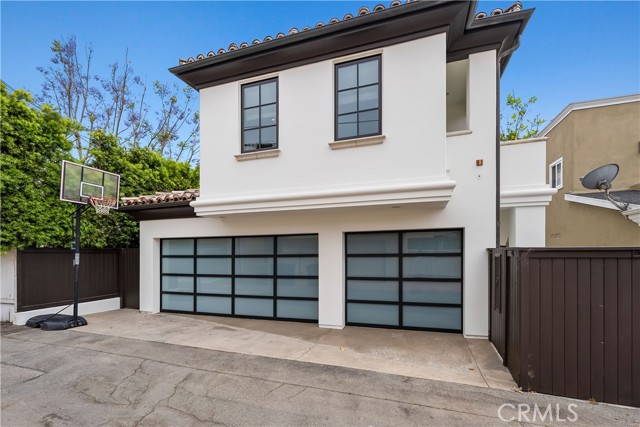 Alley side entrance to 3-car garage
