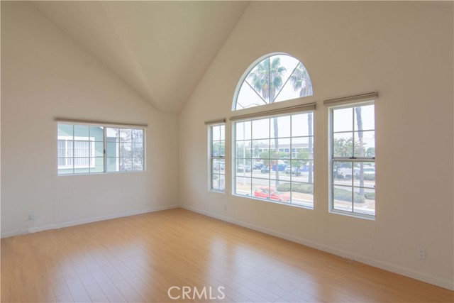 Living room with high vaulted ceilings