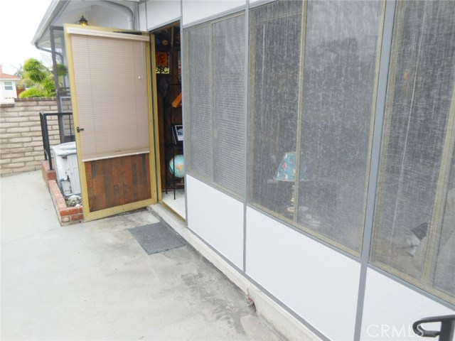 Easy to Maintained Clean Side of home with Full Cement. No Tracking Dirt or Grass into home from Either the Utility Room or Den entrance as shown here.
