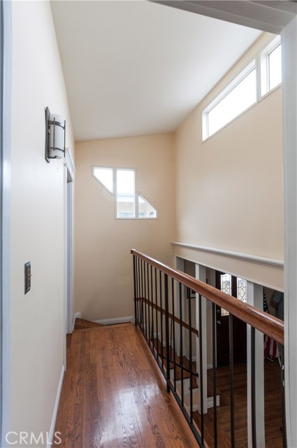 Upper hallway to master suite. Interesting windows and natural lighting features.