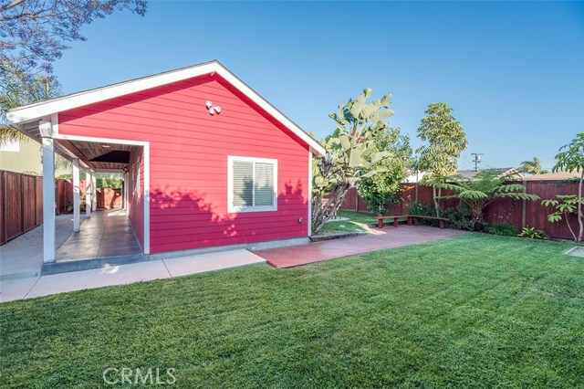 Side yard with access to back yard or the main house and cottage.