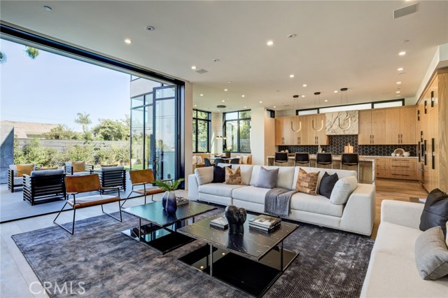 Family room opening to kitchen and backyard.