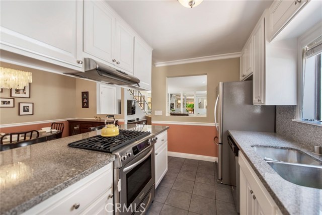 Kitchen and dining room with view of the living room