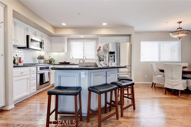 Kitchen island with plenty of storage and breakfast bar make this kitchen stand out from the rest.