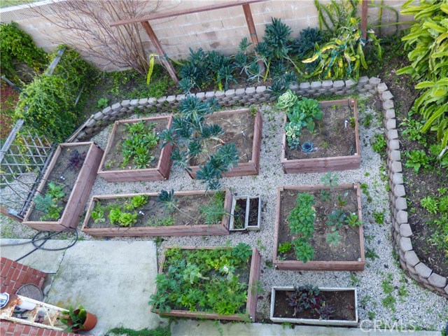View from the Master Suite's balcony of organic herb and vegetable garden