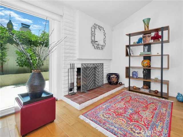 Fireplace in family room, view to outdoors.