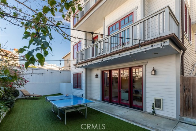 Patio off Family Room, lower balcony off Primary Suite and upper balcony off Living Room/Kitchen area of top floor
