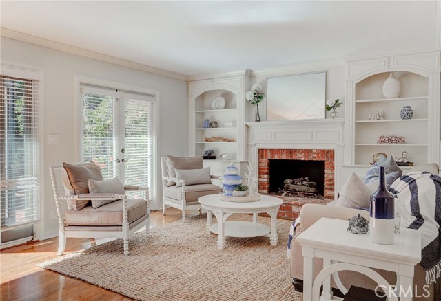 Living room conversation area with fireplace for those cool coastal nights.