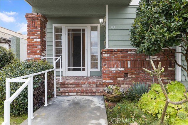 Warm inviting front entrance with the aroma of jasmine and plumeria greets you with a warm aloha .