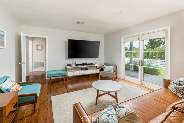 Living room with french doors and custom shades