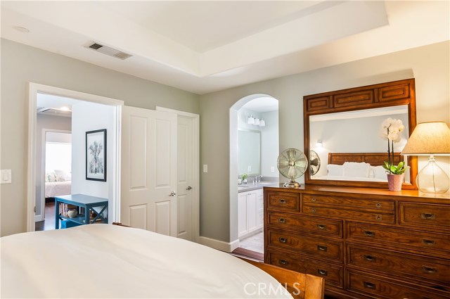 The master suite includes a beautifully renovated bath.