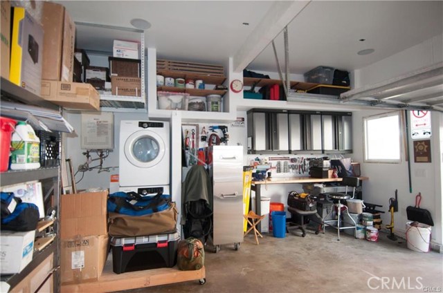 Oversized 2 car garage with washer dryer unit and tankless water heater