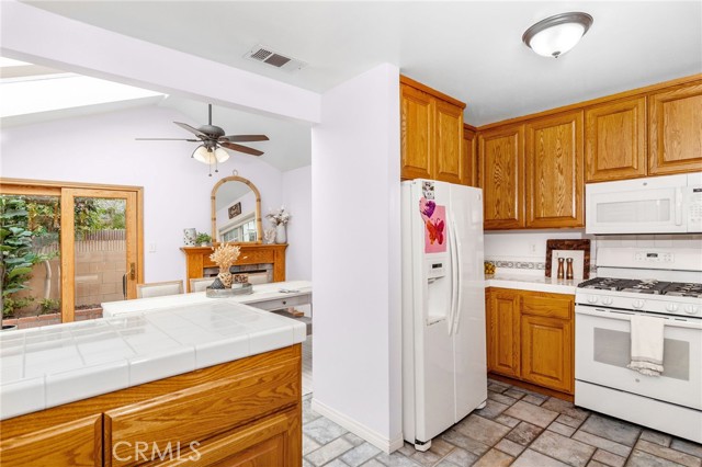 Kitchen opens to oversized dining room