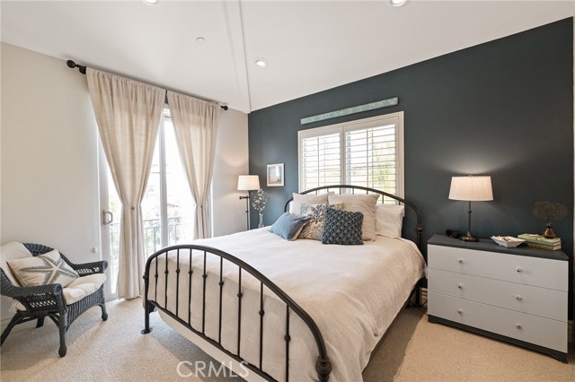 3rd bedroom featuring a Juliet balcony with sliding doors