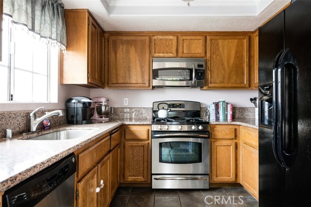 Kitchen - ocean view window, stainless appliances and granite counters. Kitchen - ocean view window, stainless appliances and granite counters.