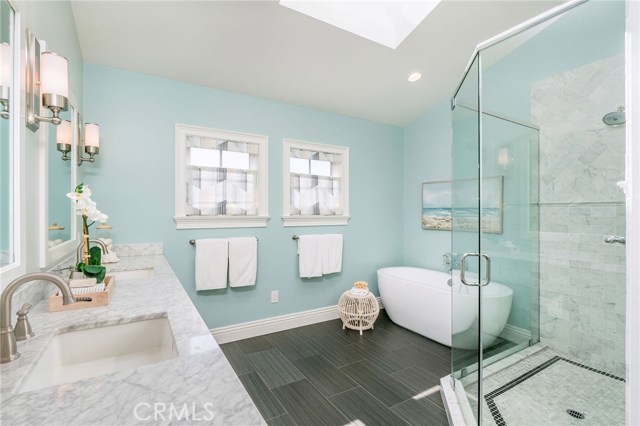 When you experience the spaciousness of this elegant Master Bath (with toilet closet not shown) you can never go back.