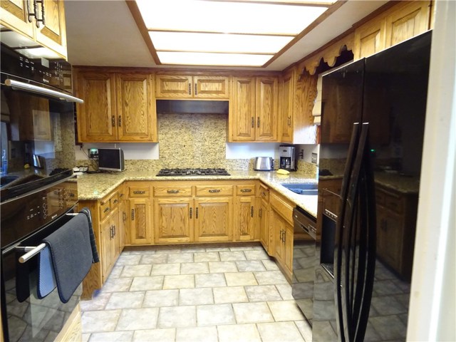 Custom kitchen. Fridge included in sale