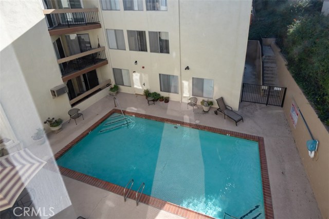 View of pool area from unit