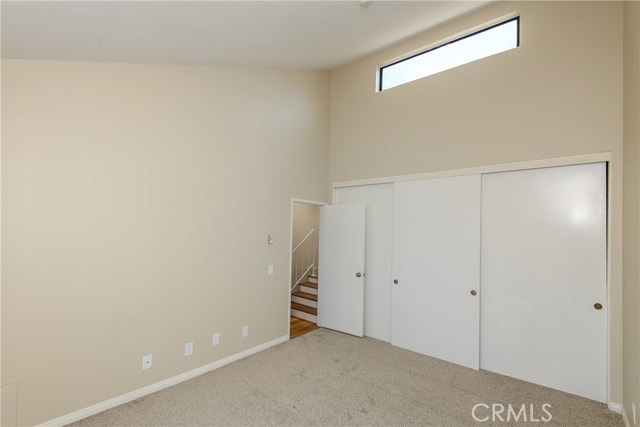 2nd bedroom with wardrobe closet and vaulted ceiling with window! 2nd bedroom with wardrobe closet and vaulted ceiling with window!