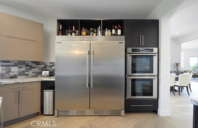 Kitchen with Double Oven and Oversize Fridge