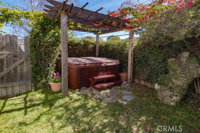 Custom built Pergola surrounding Catalina Jacuzzi. Morning Glories and Passion Fruit galore.