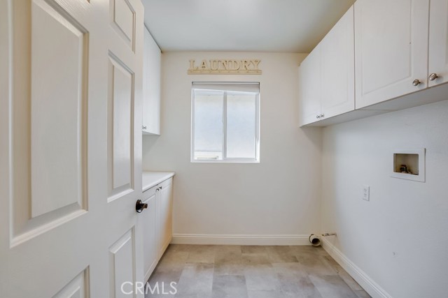 Upstairs laundry makes doing laundry a breeze (well, sort of!)