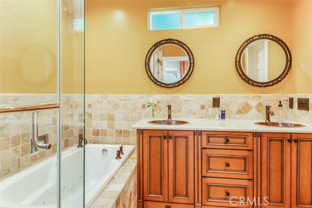 Upstairs bath with dual sinks, jetted tub and separate shower