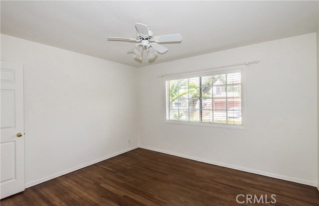 NW bedroom is about 12.5' x 11.5' with mirrored closet doors