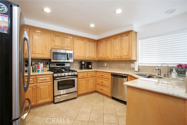 Fully loaded kitchen with lots of granite counter space