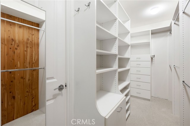 Master closet with built-ins.