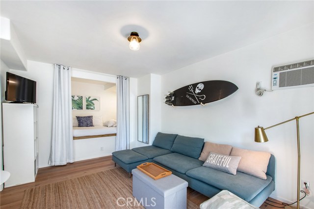 Lower level studio with built in bed nook.