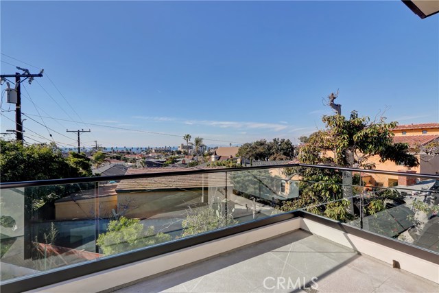 Large ocean view deck flows from family room/kitchen area