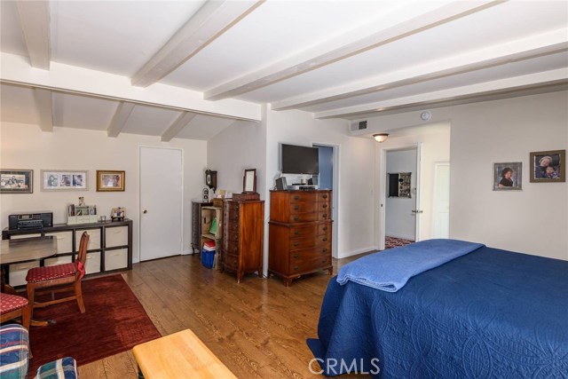 Master Suite with walk-in closet and private bath.