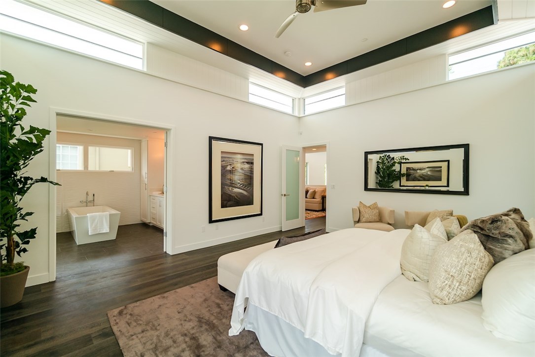 Master suite with soaring 13' ceilings.