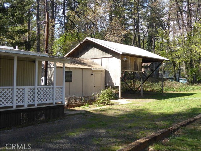 Carport and workshop behind the house.